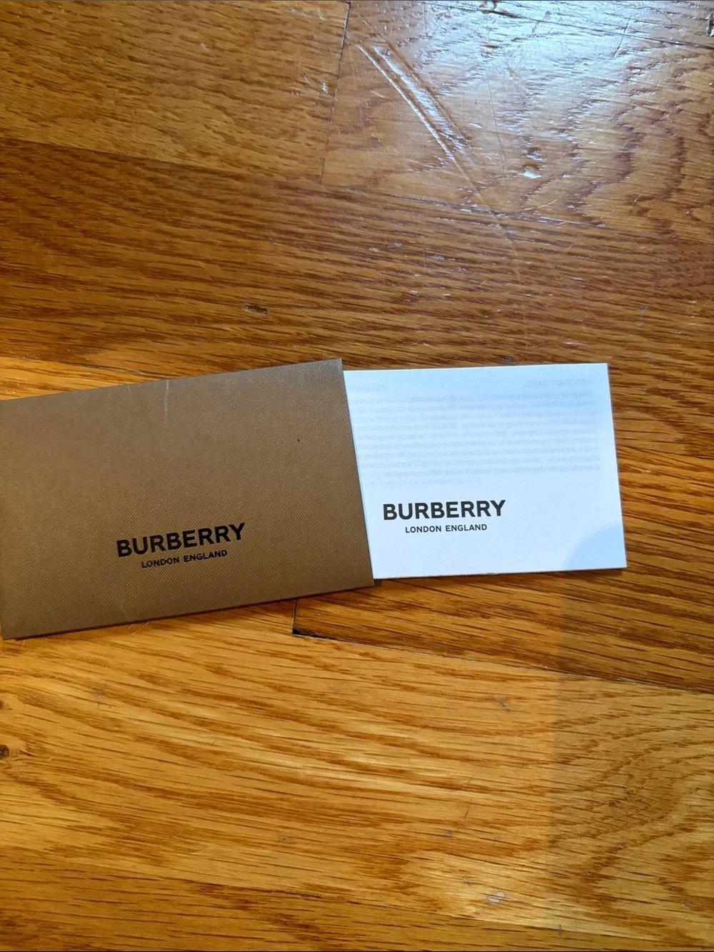 Never used! Brand New! Burberry Black Leather Card & Key Sleeve with Gold Logo